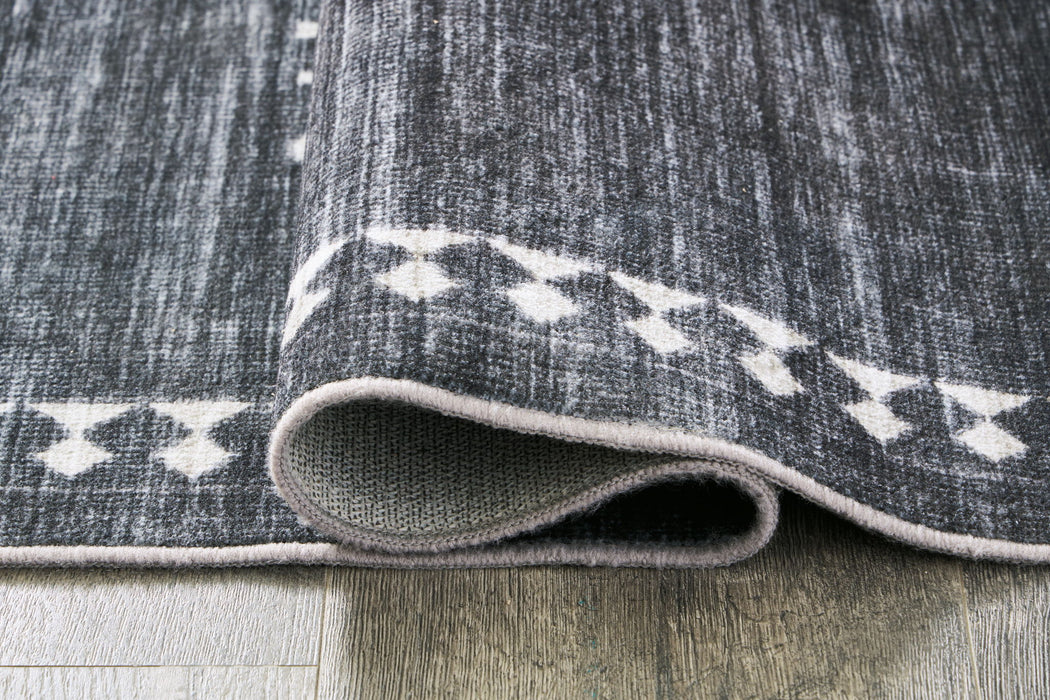 Arloman - 5' x 7' Rug - Black / Cream / Gray