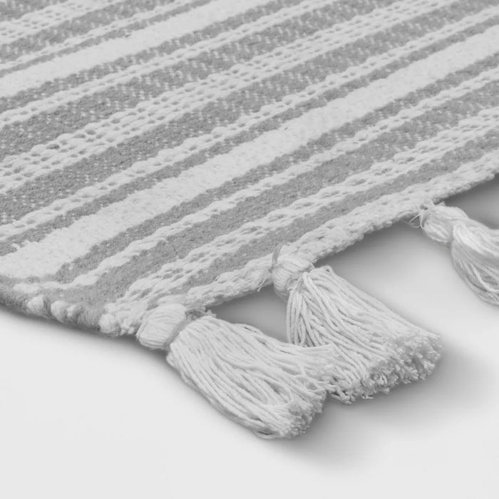 7' x 10' Pick Stitch Textured Stripe with Tassel Rug
