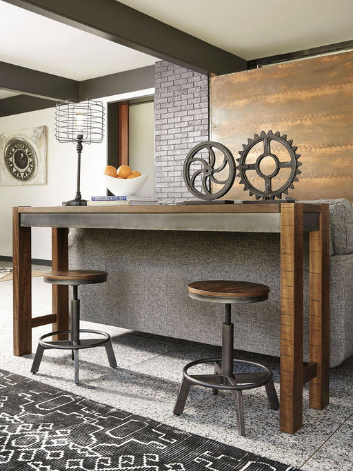 Torjin - Dark Brown - 3 Pc. - Long Counter Table, 2 Stools Cleveland Home Outlet (OH) - Furniture Store in Middleburg Heights Serving Cleveland, Strongsville, and Online