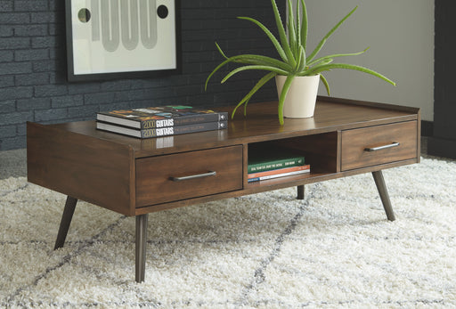 Calmoni - Brown - Rectangular Cocktail Table Cleveland Home Outlet (OH) - Furniture Store in Middleburg Heights Serving Cleveland, Strongsville, and Online