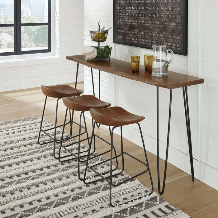 Wilinruck - Dark Brown - 4 Pc. - Long Counter Table, 3 Stools Cleveland Home Outlet (OH) - Furniture Store in Middleburg Heights Serving Cleveland, Strongsville, and Online