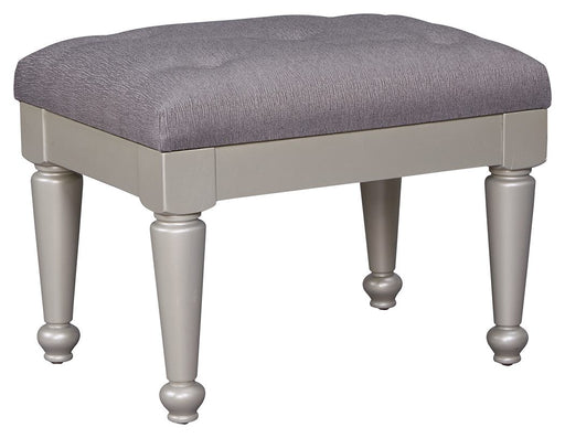 Coralayne - Silver - Upholstered Stool Cleveland Home Outlet (OH) - Furniture Store in Middleburg Heights Serving Cleveland, Strongsville, and Online