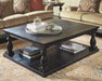 Mallacar - Black - Rectangular Cocktail Table Cleveland Home Outlet (OH) - Furniture Store in Middleburg Heights Serving Cleveland, Strongsville, and Online