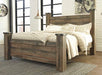 Trinell - Brown - King Poster Headboard Panel Cleveland Home Outlet (OH) - Furniture Store in Middleburg Heights Serving Cleveland, Strongsville, and Online