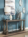 Johnelle - Gray - Sofa Table Cleveland Home Outlet (OH) - Furniture Store in Middleburg Heights Serving Cleveland, Strongsville, and Online