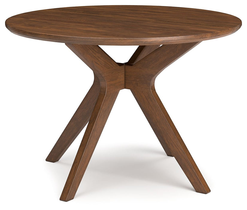 Lyncott - Brown - Round Dining Room Table Cleveland Home Outlet (OH) - Furniture Store in Middleburg Heights Serving Cleveland, Strongsville, and Online