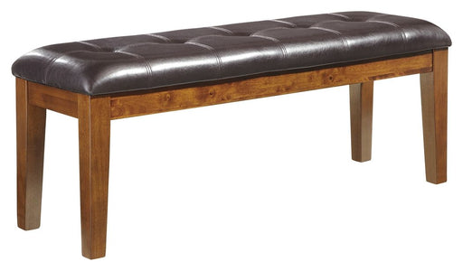 Ralene - Medium Brown - Large Uph Dining Room Bench Cleveland Home Outlet (OH) - Furniture Store in Middleburg Heights Serving Cleveland, Strongsville, and Online