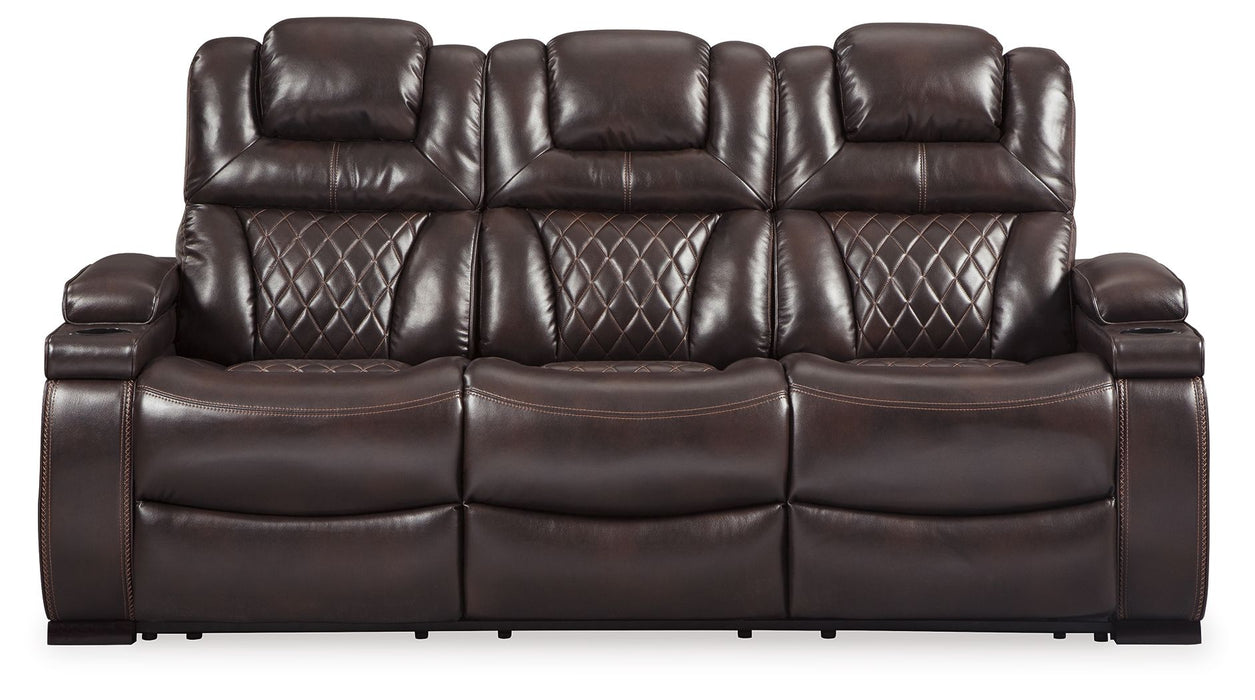 Warnerton - Brown Dark - Pwr Rec Sofa With Adj Headrest Cleveland Home Outlet (OH) - Furniture Store in Middleburg Heights Serving Cleveland, Strongsville, and Online