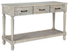 Shawnalore - Whitewash - Sofa Table Cleveland Home Outlet (OH) - Furniture Store in Middleburg Heights Serving Cleveland, Strongsville, and Online